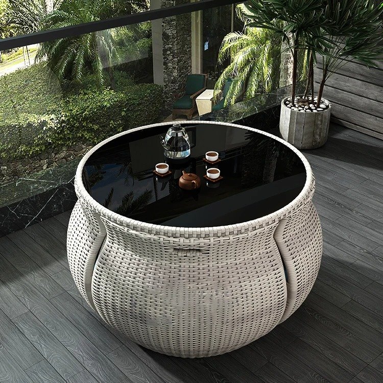 Transform your outdoor space with the Elegant Modern Outdoor Rattan Furniture Set. This chic and durable three-piece set, featuring a sleek dining table and two matching chairs, adds a touch of sophistication to any garden, balcony, or patio. Crafted from high-quality rattan, it's built to withstand the elements while providing maximum comfort and style. Perfect for dining or relaxing, this set enhances your outdoor experience with its minimalist design and weather-resistant materials. Create your own outdoor haven today!
