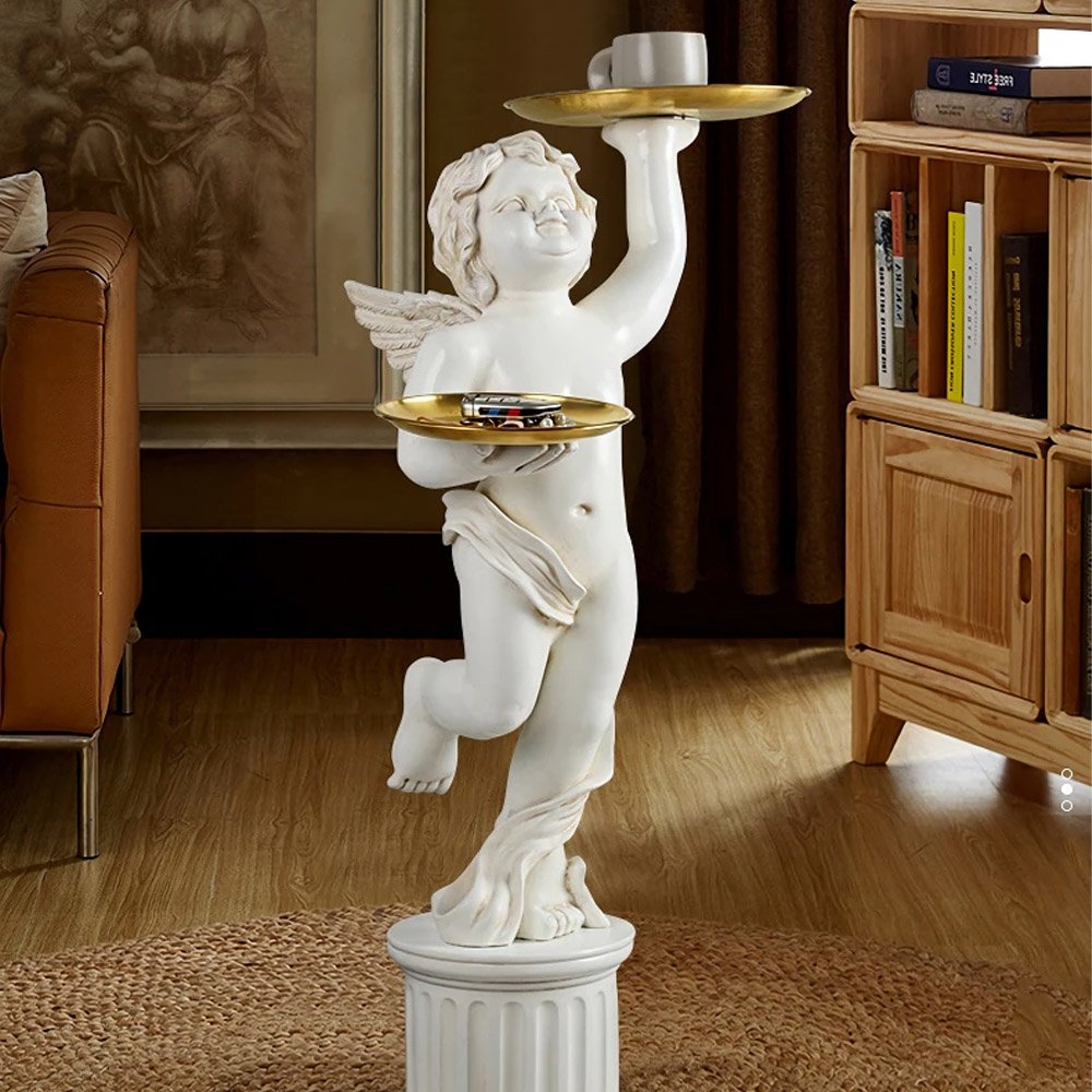 33cd5750dfe4f705667387bf8f537840.jpg-full The European Style Cupid Angel Resin Statue is a perfect blend of elegance and practicality, bringing a touch of divine beauty to any room. Hand-carved from eco-friendly resin, this stunning statue features exquisite detail and is paired with a LINGAR metal tray for convenient storage of small items like keys, remote controls, or decorative pieces. The Roman column base adds both stability and artistic flair, making it an eye-catching accent in living rooms, bedrooms, or hallways. Available in white, gold, or vintage white, this versatile piece is ideal for homes or offices, offering both charm and functionality. Add this enchanting sculpture to your decor and enjoy its timeless beauty every day.