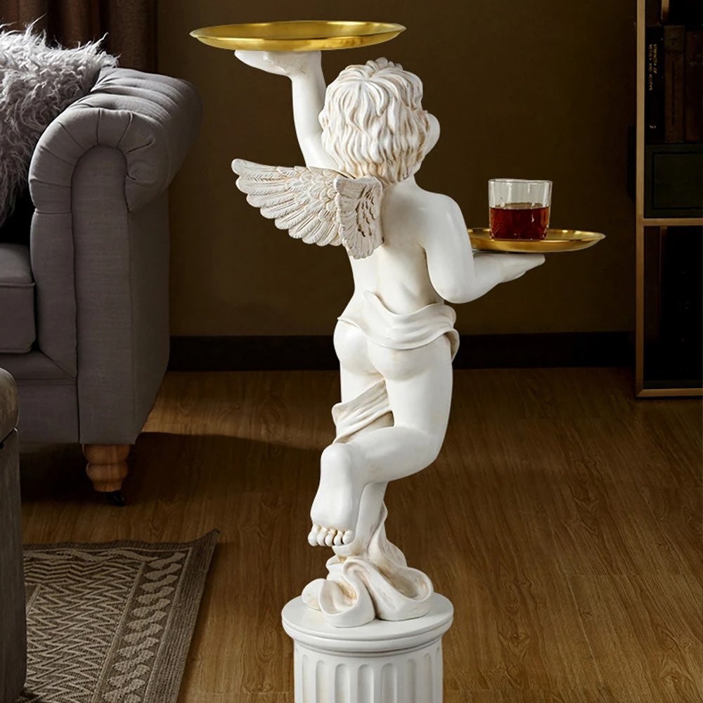 58d824652f7f10c106e722093242a4d4.jpg-full The European Style Cupid Angel Resin Statue is a perfect blend of elegance and practicality, bringing a touch of divine beauty to any room. Hand-carved from eco-friendly resin, this stunning statue features exquisite detail and is paired with a LINGAR metal tray for convenient storage of small items like keys, remote controls, or decorative pieces. The Roman column base adds both stability and artistic flair, making it an eye-catching accent in living rooms, bedrooms, or hallways. Available in white, gold, or vintage white, this versatile piece is ideal for homes or offices, offering both charm and functionality. Add this enchanting sculpture to your decor and enjoy its timeless beauty every day.