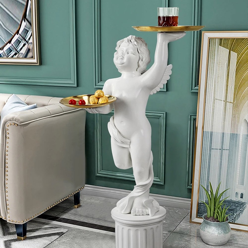 66b0a2566368fa3774dde5d63b6c1efd.jpg-full The European Style Cupid Angel Resin Statue is a perfect blend of elegance and practicality, bringing a touch of divine beauty to any room. Hand-carved from eco-friendly resin, this stunning statue features exquisite detail and is paired with a LINGAR metal tray for convenient storage of small items like keys, remote controls, or decorative pieces. The Roman column base adds both stability and artistic flair, making it an eye-catching accent in living rooms, bedrooms, or hallways. Available in white, gold, or vintage white, this versatile piece is ideal for homes or offices, offering both charm and functionality. Add this enchanting sculpture to your decor and enjoy its timeless beauty every day.