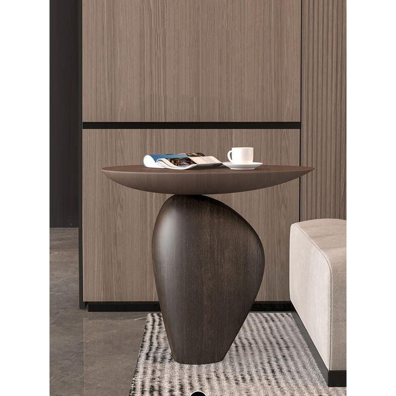 Bring modern elegance to your home with the Nordic Creative Cobblestone Side Table. Crafted from high-quality resin, this handmade piece mimics the natural beauty of cobblestones, adding a unique and artistic touch to your space. Its versatile design fits perfectly in living rooms, studies, or bedrooms, offering both style and functionality. Available in black or walnut, this table is a standout with its minimalist, Nordic-inspired look. Each handcrafted piece ensures no two are alike, making it a distinctive addition to your decor. Perfect as a decorative accent or a thoughtful gift, this side table brings both charm and durability to any room.