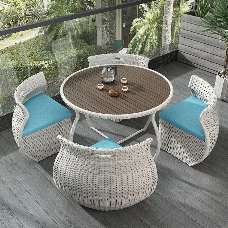 Transform your outdoor space with the Elegant Modern Outdoor Rattan Furniture Set. This chic and durable three-piece set, featuring a sleek dining table and two matching chairs, adds a touch of sophistication to any garden, balcony, or patio. Crafted from high-quality rattan, it's built to withstand the elements while providing maximum comfort and style. Perfect for dining or relaxing, this set enhances your outdoor experience with its minimalist design and weather-resistant materials. Create your own outdoor haven today!