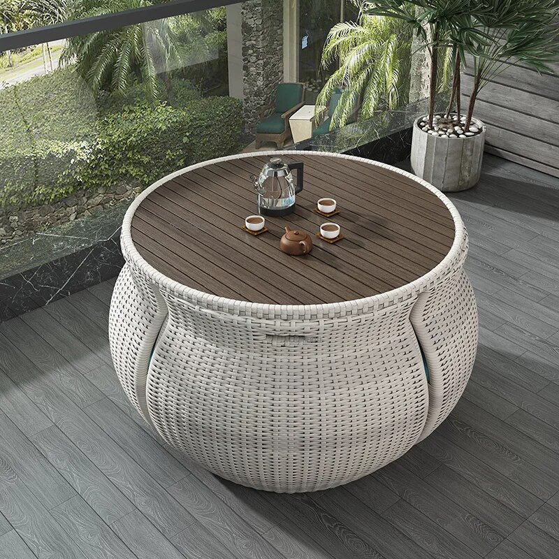 Transform your outdoor space with the Elegant Modern Outdoor Rattan Furniture Set. This chic and durable three-piece set, featuring a sleek dining table and two matching chairs, adds a touch of sophistication to any garden, balcony, or patio. Crafted from high-quality rattan, it's built to withstand the elements while providing maximum comfort and style. Perfect for dining or relaxing, this set enhances your outdoor experience with its minimalist design and weather-resistant materials. Create your own outdoor haven today!