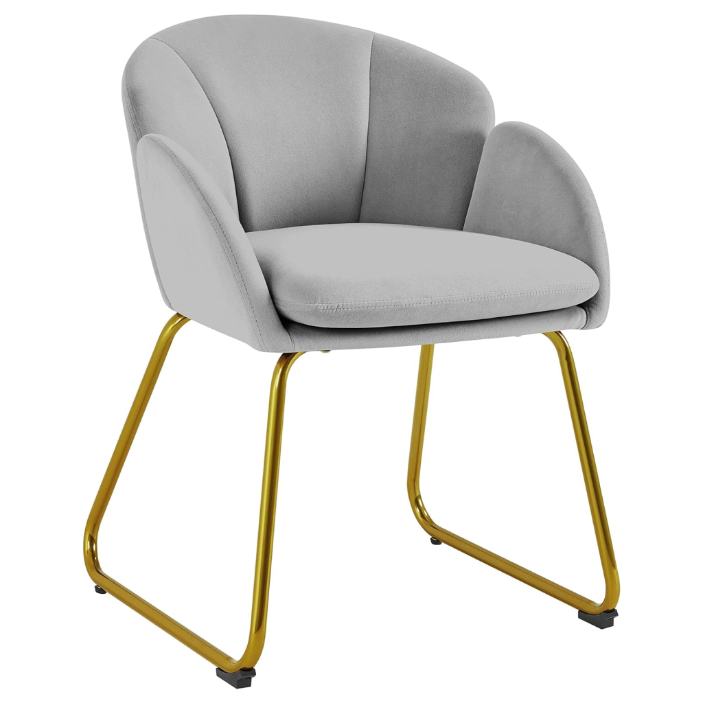 fc27c1c8ab59821f7f4a4c4f1503d0c5 Introducing the Flower Shape Velvet Armchair with Golden Metal Legs, a striking blend of modern design and exceptional comfort. This armchair is the ideal choice for anyone looking to elevate the style of their living room, bedroom, dressing room, or home office. Made from premium materials, it’s not just visually appealing but also built to provide long-lasting comfort and support.