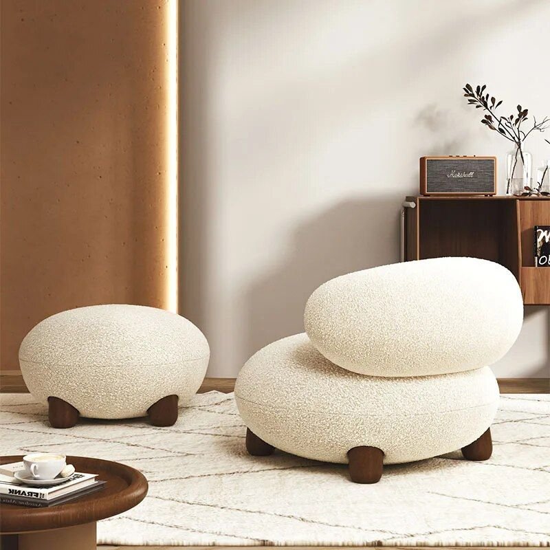 Introducing our Modern Minimalist Armless Sofa Chair, a perfect blend of contemporary design and ergonomic comfort. With a sleek, compact frame and luxurious composite fabric upholstery, this chair adds elegance to any living room or office. Its eco-friendly marble finish and durable construction ensure long-lasting beauty, while its ergonomic design provides ultimate comfort for relaxation or reading. Ideal for small spaces, this versatile chair is a statement piece that elevates any modern interior. Experience the perfect combination of style, comfort, and sustainability—order now to transform your space!