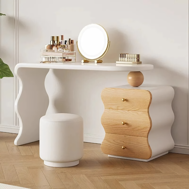 Introducing the Modern Minimalist Vanity Desk, the perfect blend of style, functionality, and comfort for your personal space. Crafted from solid wood, this vanity desk features a sleek design with two spacious drawers to keep your essentials organized. The elegant mirror and comfortable makeup stool create a luxurious grooming experience, while its minimalist style complements any décor. Ideal for daily beauty routines or quick touch-ups, this vanity desk transforms your bedroom into a chic, clutter-free haven. Easy to assemble and built to last, it's the perfect addition to elevate your space.