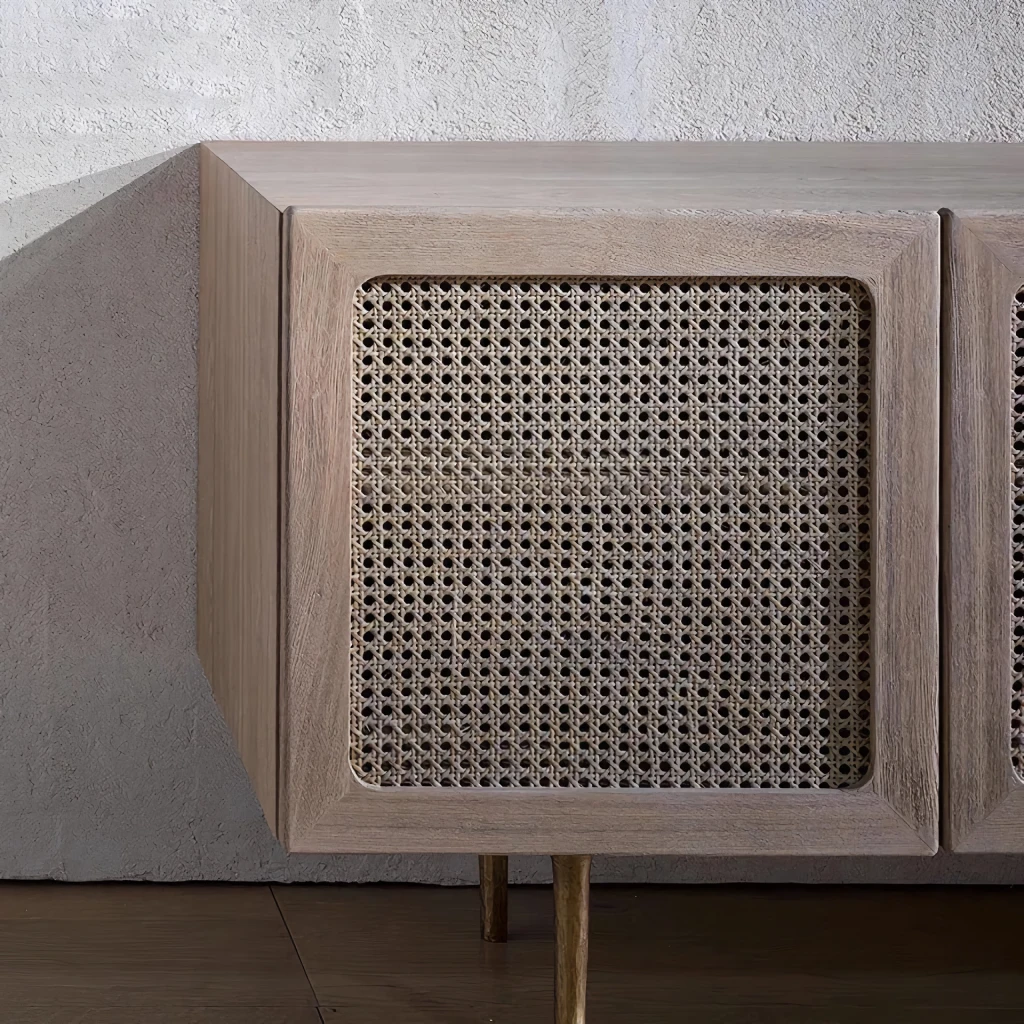 Introducing the Scandinavian Modern Rattan TV Cabinet—a perfect fusion of style and functionality. Crafted from solid wood with chic rattan detailing, this TV cabinet brings timeless Scandinavian design into your living room. Offering ample storage for media and accessories, its clean lines and natural wood finish create a warm, inviting ambiance. Easy to install and built for durability, this cabinet elevates any modern or minimalist space. Order today and add a touch of elegance and practicality to your home.