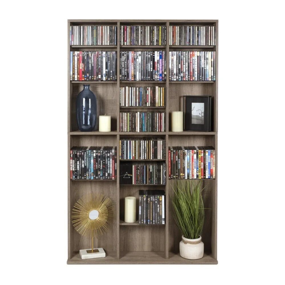 Elevate your space with the Weathered Oak Woodgrain Media Storage Bookcase, where style meets functionality. Featuring adjustable shelving and a sturdy wide base, this bookcase offers generous storage for books, media, and collectibles while maintaining a sleek, contemporary design. The warm maple tones and weathered oak finish bring a timeless charm to any room, from living rooms to home offices. Whether you're organizing your media collection or showcasing your favorite items, this versatile piece adapts to your needs with ease. Experience the perfect balance of elegance and practicality—order yours today!