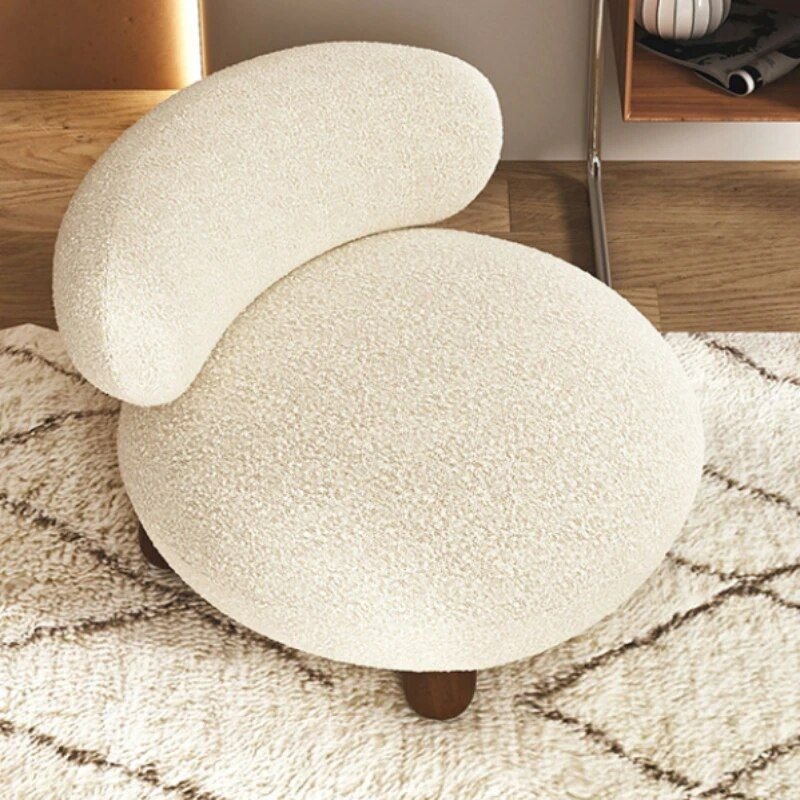 Introducing our Modern Minimalist Armless Sofa Chair, a perfect blend of contemporary design and ergonomic comfort. With a sleek, compact frame and luxurious composite fabric upholstery, this chair adds elegance to any living room or office. Its eco-friendly marble finish and durable construction ensure long-lasting beauty, while its ergonomic design provides ultimate comfort for relaxation or reading. Ideal for small spaces, this versatile chair is a statement piece that elevates any modern interior. Experience the perfect combination of style, comfort, and sustainability—order now to transform your space!