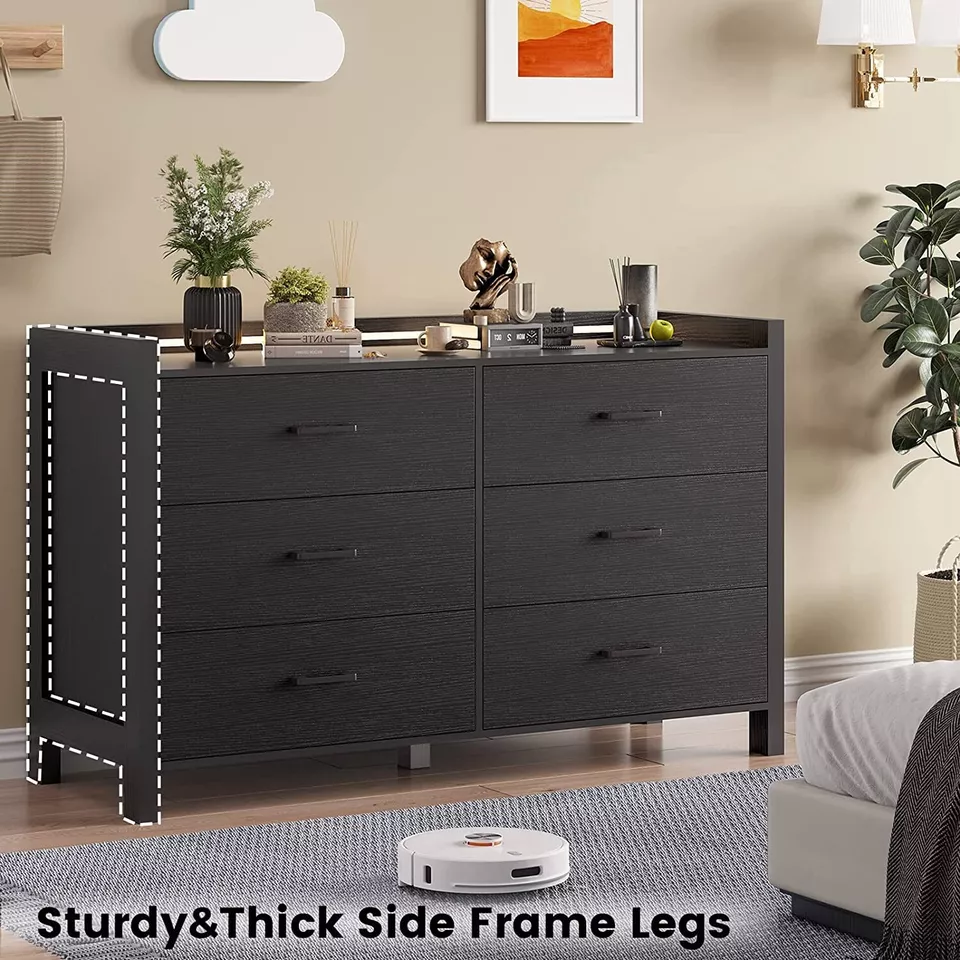 Elevate your space with the Modern LED 6-Drawer Dresser, where style meets smart functionality. This sleek black dresser features customizable LED lighting with over 60,000 color options and dynamic effects, all controlled via app or remote. Crafted from high-quality engineered wood, it offers durability and ample storage with six spacious drawers and a large tabletop. Perfect for bedrooms, living rooms, or nurseries, its modern design enhances any room while keeping your space organized. With easy installation and safety features, this dresser transforms both your décor and daily routine.