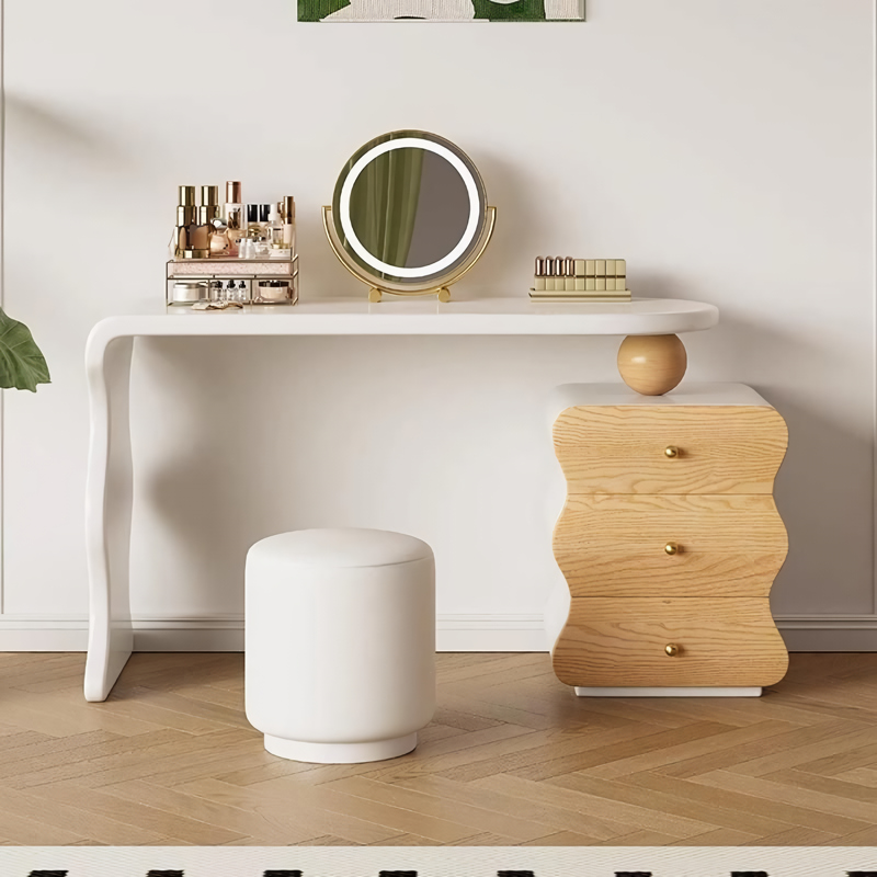 Introducing the Modern Minimalist Vanity Desk, the perfect blend of style, functionality, and comfort for your personal space. Crafted from solid wood, this vanity desk features a sleek design with two spacious drawers to keep your essentials organized. The elegant mirror and comfortable makeup stool create a luxurious grooming experience, while its minimalist style complements any décor. Ideal for daily beauty routines or quick touch-ups, this vanity desk transforms your bedroom into a chic, clutter-free haven. Easy to assemble and built to last, it's the perfect addition to elevate your space.