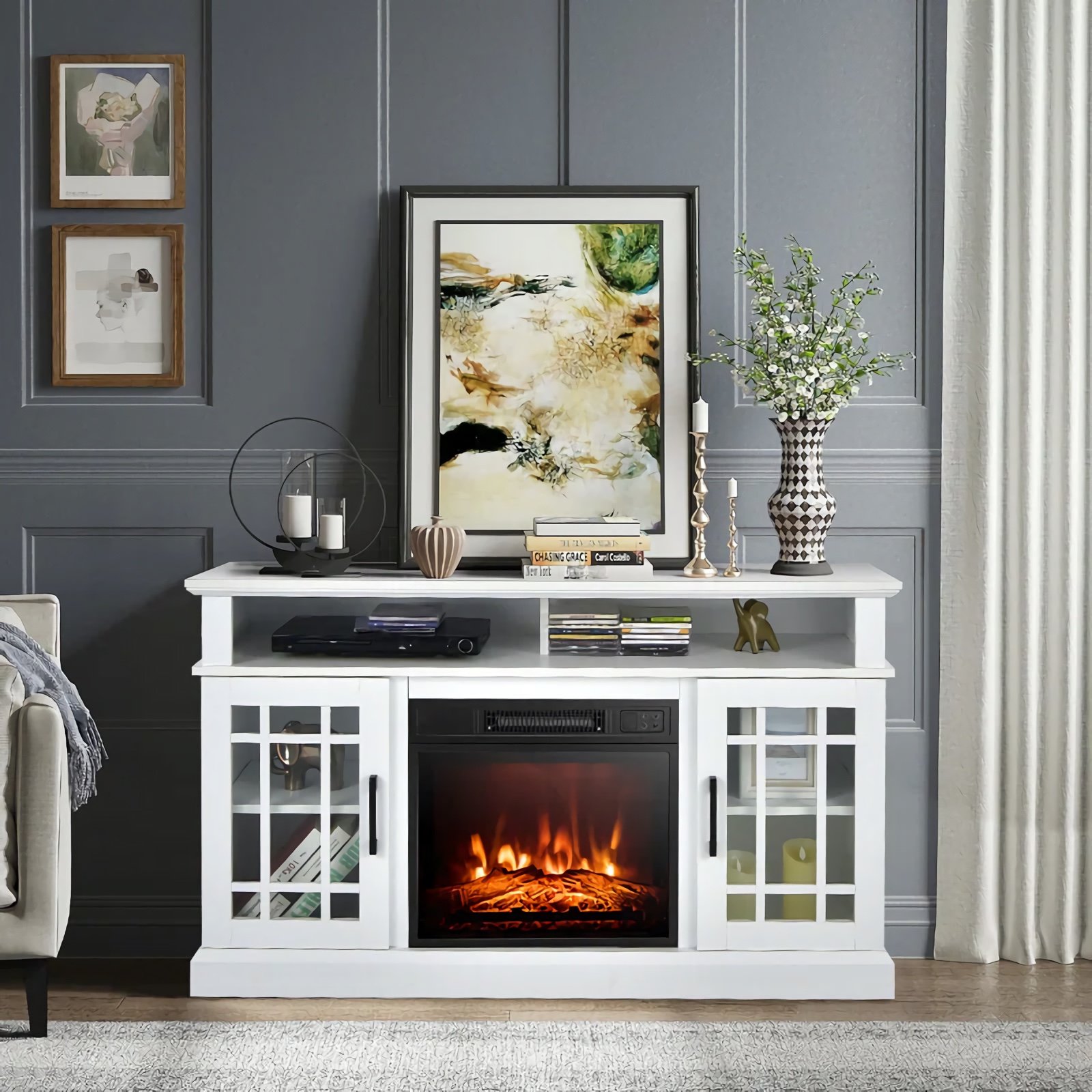 Create a cozy and stylish atmosphere with our Modern Black Electric Fireplace TV Stand, designed to fit TVs up to 55 inches. Featuring an 18-inch electric fireplace with adjustable heat settings, it provides warmth and ambiance with realistic LED flames and a quiet operation. The stand offers ample storage with a large tabletop, two open compartments, and side cabinets with adjustable shelves. With easy-to-use controls, overheat protection, and cable management for a tidy setup, this multi-functional piece enhances both the look and comfort of your living room or bedroom. Ideal for year-round use, it’s the perfect combination of elegance and practicality.