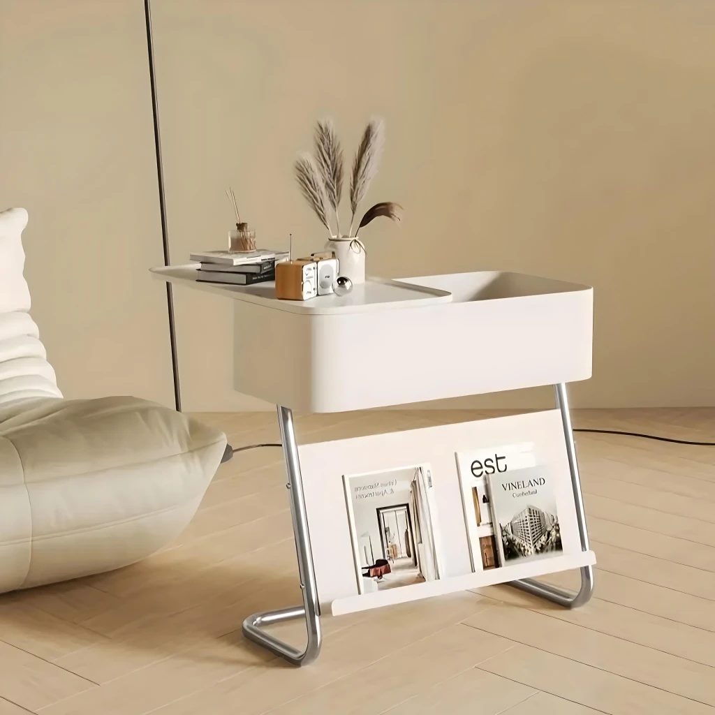 3a222d9ce5c0c8794a42561d16a9722a Elevate your living space with the Cart Sofa Side Table, a perfect blend of modern design and practical functionality. Featuring a sleek oval shape, sturdy metal construction, and a removable storage cabinet, this table helps keep your essentials organized while enhancing your decor. The built-in rollers make it easy to move and adjust, offering versatility as a sofa side table, tea table, or bedside companion. With its sophisticated charm and convenience, this table is an ideal addition to any contemporary home.