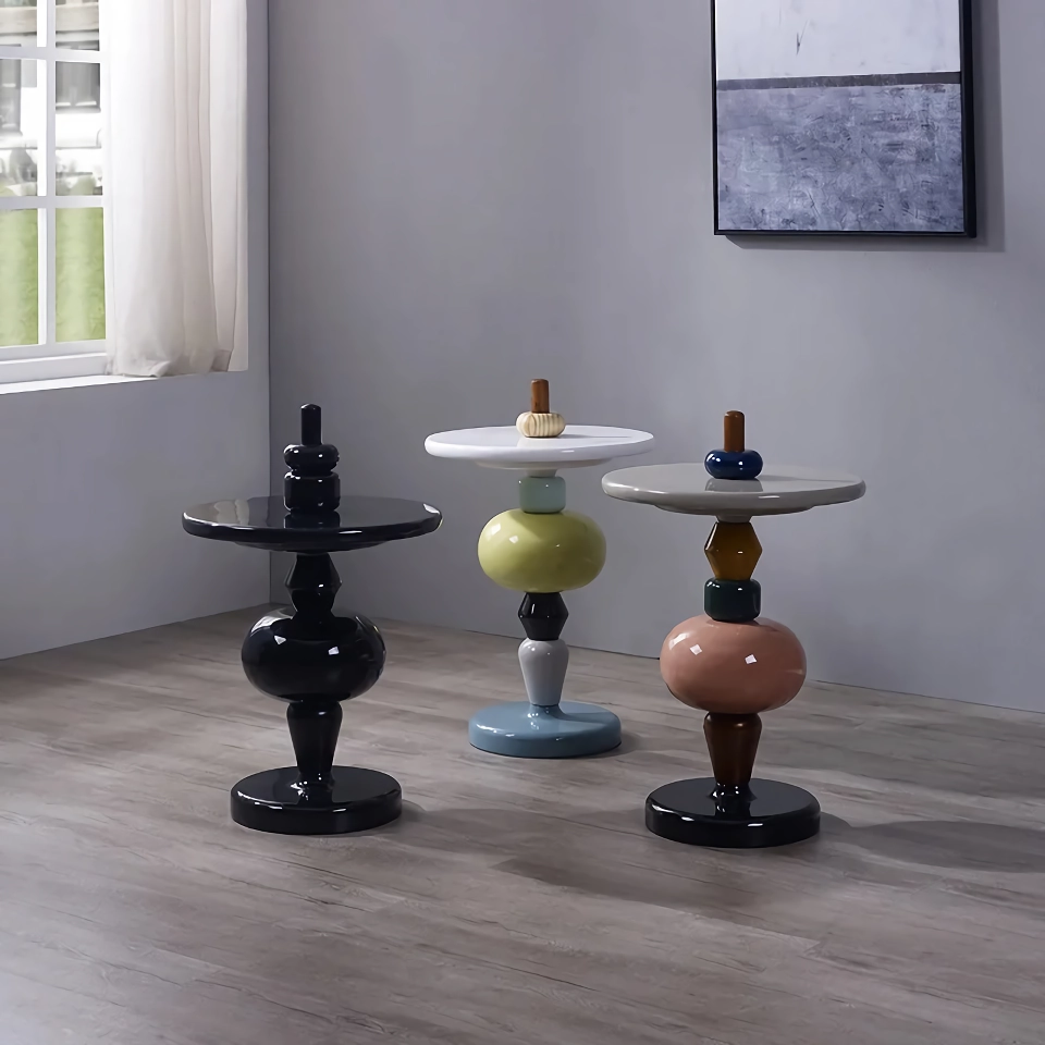 Enhance your home with the sleek and versatile Nordic Modern Minimalist Side Table. Crafted from durable stainless steel, this modern round table adds a touch of elegance to any room. Its compact, movable design makes it perfect for small spaces, offering a convenient surface for drinks, books, or decor items. Available in multiple stylish color options, it seamlessly blends into living rooms, bedrooms, and offices, providing both practicality and contemporary charm. Ideal for flexible placement, this side table is a must-have for any modern home.