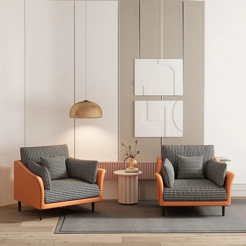 4be75431e719acdfec6af530a27b1ae7.jpg-full Introducing our Modern Nordic Single Sofa Chair, the perfect combination of style, comfort, and sophistication. Designed with sleek, contemporary lines, this chair is ideal for any room, offering both functionality and luxury. Made from high-quality composite fabrics and featuring a sturdy metal frame, it ensures lasting comfort and stability. Whether you’re unwinding in your living room, enjoying a quiet read in the bedroom, or adding elegance to your office, this chair enhances any space. With no assembly required and free shipping included, elevate your home with this stylish, versatile piece today!