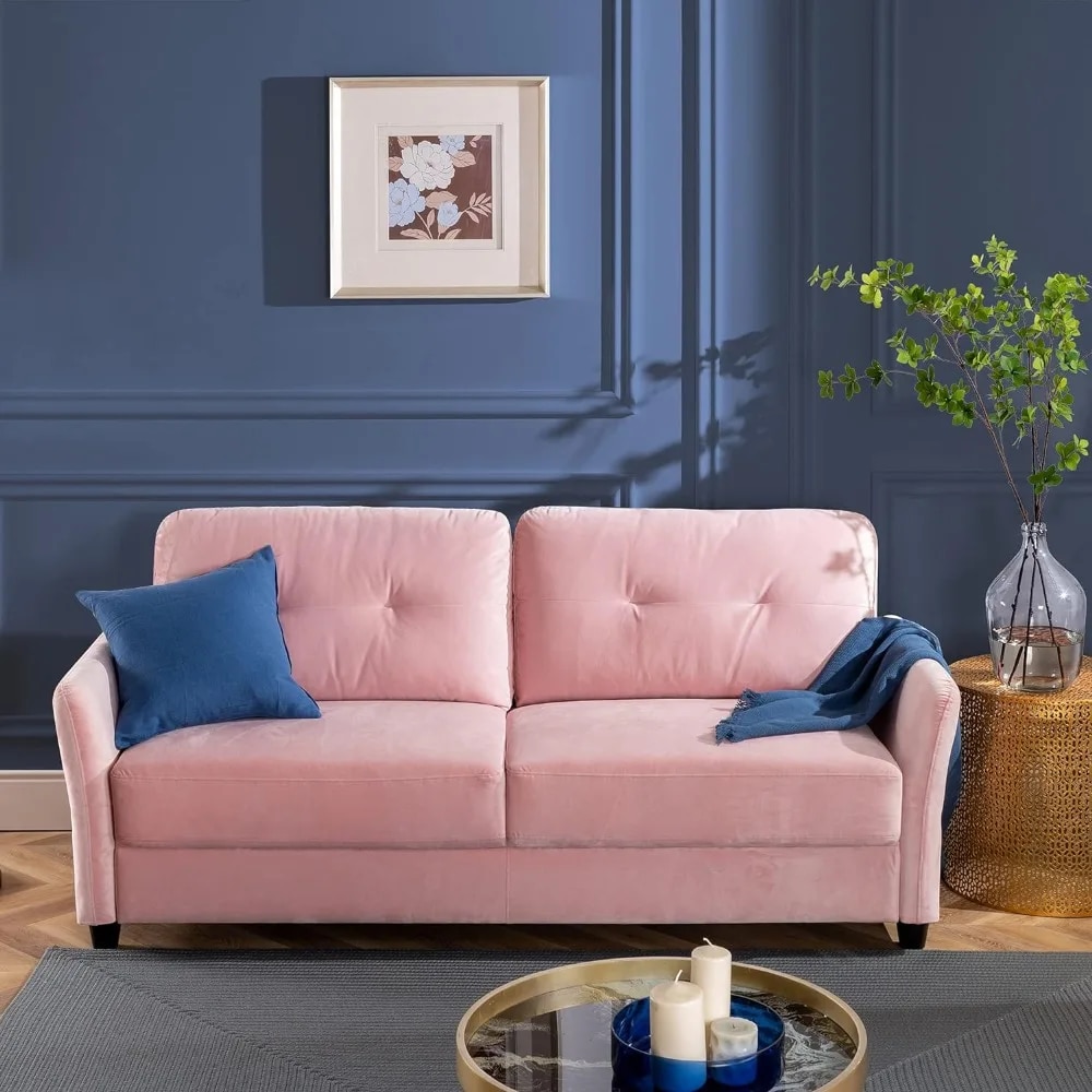 Introducing our Luxurious Velvet Two-Seater Sofa, the perfect blend of comfort and sophistication for your living space. With plush velvet upholstery and supportive foam and fiber cushions, this sofa offers an indulgent seating experience. The durable frame supports up to 750 lbs, ensuring long-lasting stability. Enjoy hassle-free, tool-free assembly in under 20 minutes, making it a convenient and stylish addition to any room. Available in a variety of luxurious shades, this sofa effortlessly combines elegance with practical comfort. Transform your living room into a cozy retreat today!