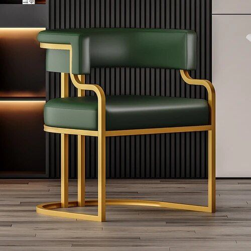 663e65b109ee0f34ebf35b0ed677692b Introducing the Elegant Modern Accent Dining Chair with Handrails – a perfect fusion of style, comfort, and durability. Crafted with sturdy metal and designed in a sleek minimalist style, this chair enhances any space, from dining rooms to offices or outdoor areas. Its ergonomic backrest and convenient handrails offer extra comfort and support for extended seating. Measuring 50x56x73cm, it provides generous space while fitting seamlessly into various decor themes. Whether you're hosting a dinner party or simply enjoying a meal, this chair delivers both elegance and functionality, making it a versatile addition to any room.