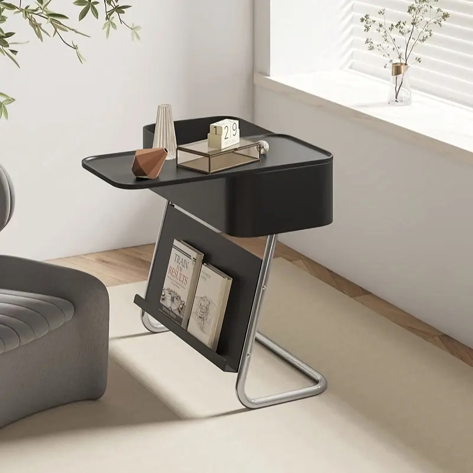 6a95b3757d63405a150afbae7b71ca66.jpeg-full Elevate your living space with the Cart Sofa Side Table, a perfect blend of modern design and practical functionality. Featuring a sleek oval shape, sturdy metal construction, and a removable storage cabinet, this table helps keep your essentials organized while enhancing your decor. The built-in rollers make it easy to move and adjust, offering versatility as a sofa side table, tea table, or bedside companion. With its sophisticated charm and convenience, this table is an ideal addition to any contemporary home.