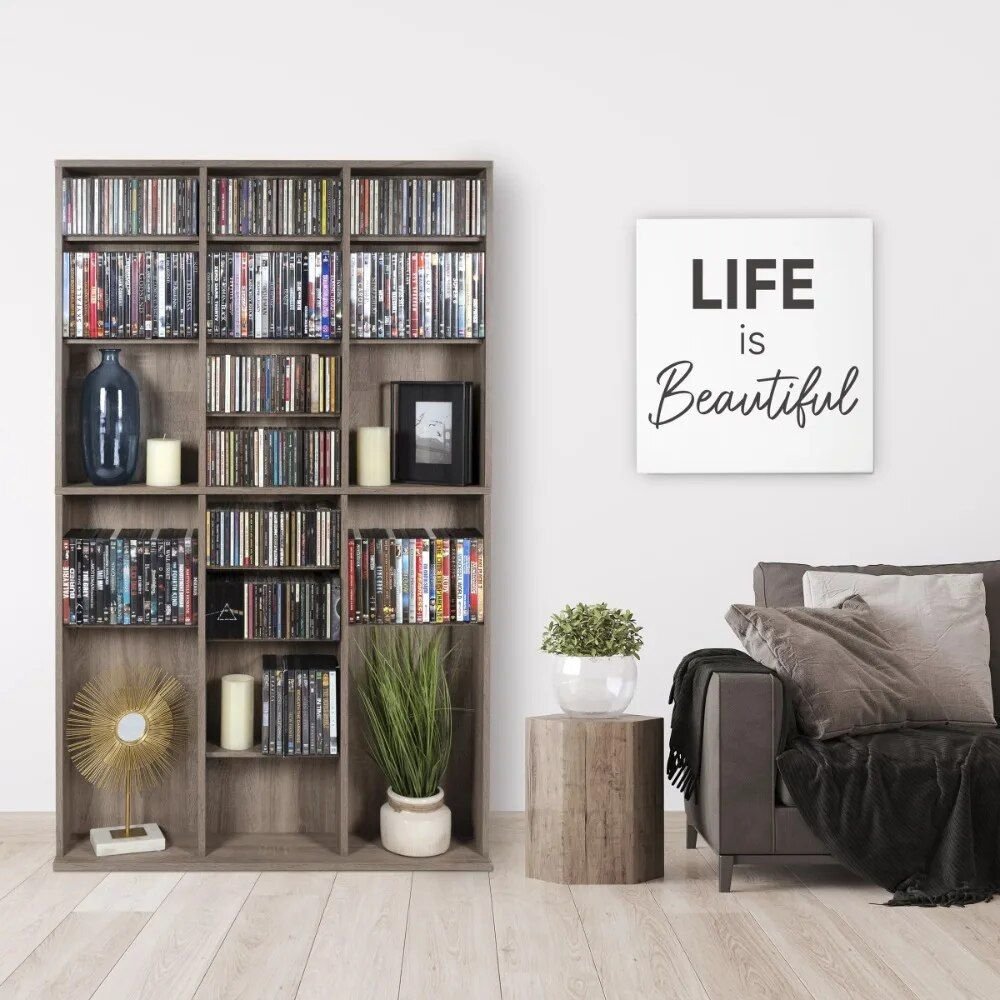 6bcf6f75d45397f5212bd7942a5657c0.jpg-full Elevate your space with the Weathered Oak Woodgrain Media Storage Bookcase, where style meets functionality. Featuring adjustable shelving and a sturdy wide base, this bookcase offers generous storage for books, media, and collectibles while maintaining a sleek, contemporary design. The warm maple tones and weathered oak finish bring a timeless charm to any room, from living rooms to home offices. Whether you're organizing your media collection or showcasing your favorite items, this versatile piece adapts to your needs with ease. Experience the perfect balance of elegance and practicality—order yours today!