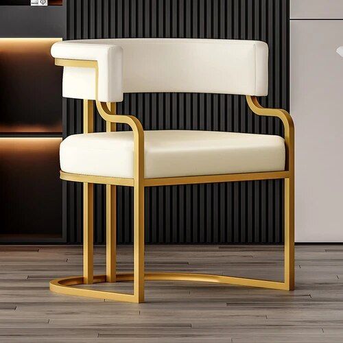 979aba45f8a67d0293c71c35bd090a42 Introducing the Elegant Modern Accent Dining Chair with Handrails – a perfect fusion of style, comfort, and durability. Crafted with sturdy metal and designed in a sleek minimalist style, this chair enhances any space, from dining rooms to offices or outdoor areas. Its ergonomic backrest and convenient handrails offer extra comfort and support for extended seating. Measuring 50x56x73cm, it provides generous space while fitting seamlessly into various decor themes. Whether you're hosting a dinner party or simply enjoying a meal, this chair delivers both elegance and functionality, making it a versatile addition to any room.