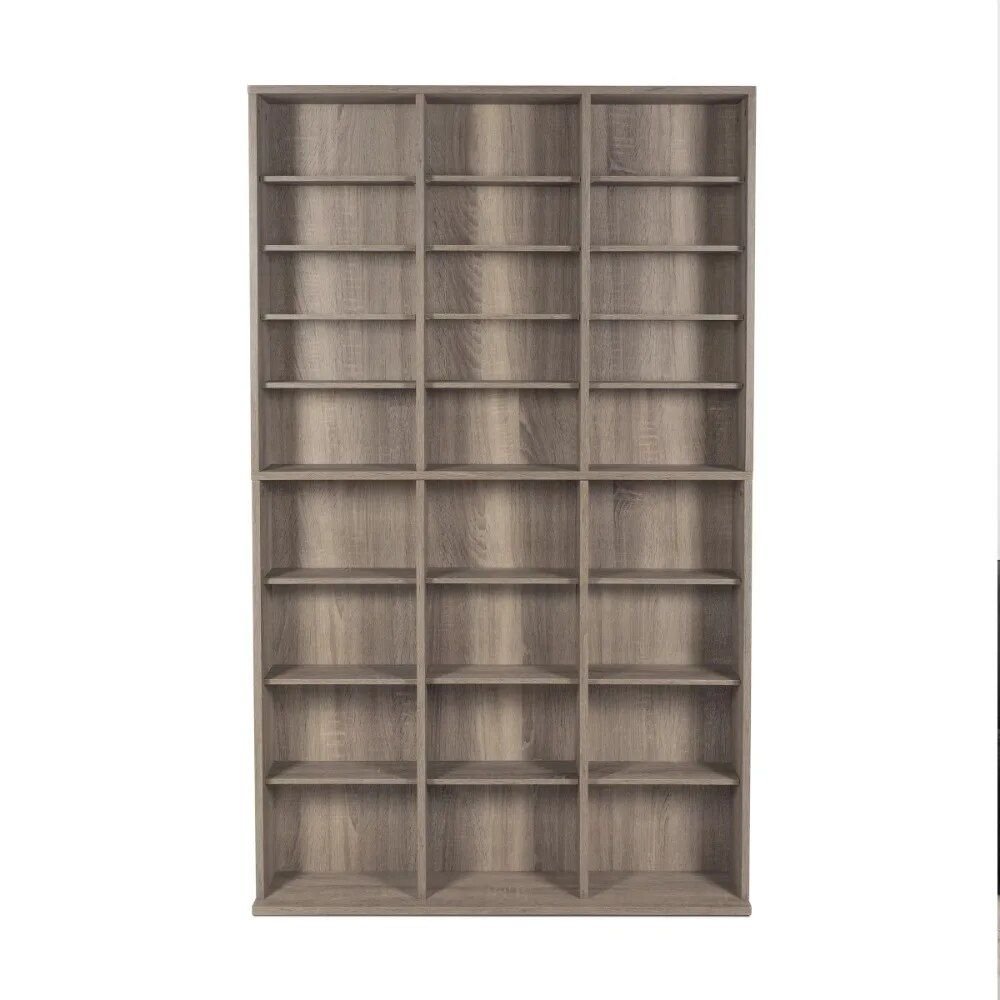 Elevate your space with the Weathered Oak Woodgrain Media Storage Bookcase, where style meets functionality. Featuring adjustable shelving and a sturdy wide base, this bookcase offers generous storage for books, media, and collectibles while maintaining a sleek, contemporary design. The warm maple tones and weathered oak finish bring a timeless charm to any room, from living rooms to home offices. Whether you're organizing your media collection or showcasing your favorite items, this versatile piece adapts to your needs with ease. Experience the perfect balance of elegance and practicality—order yours today!