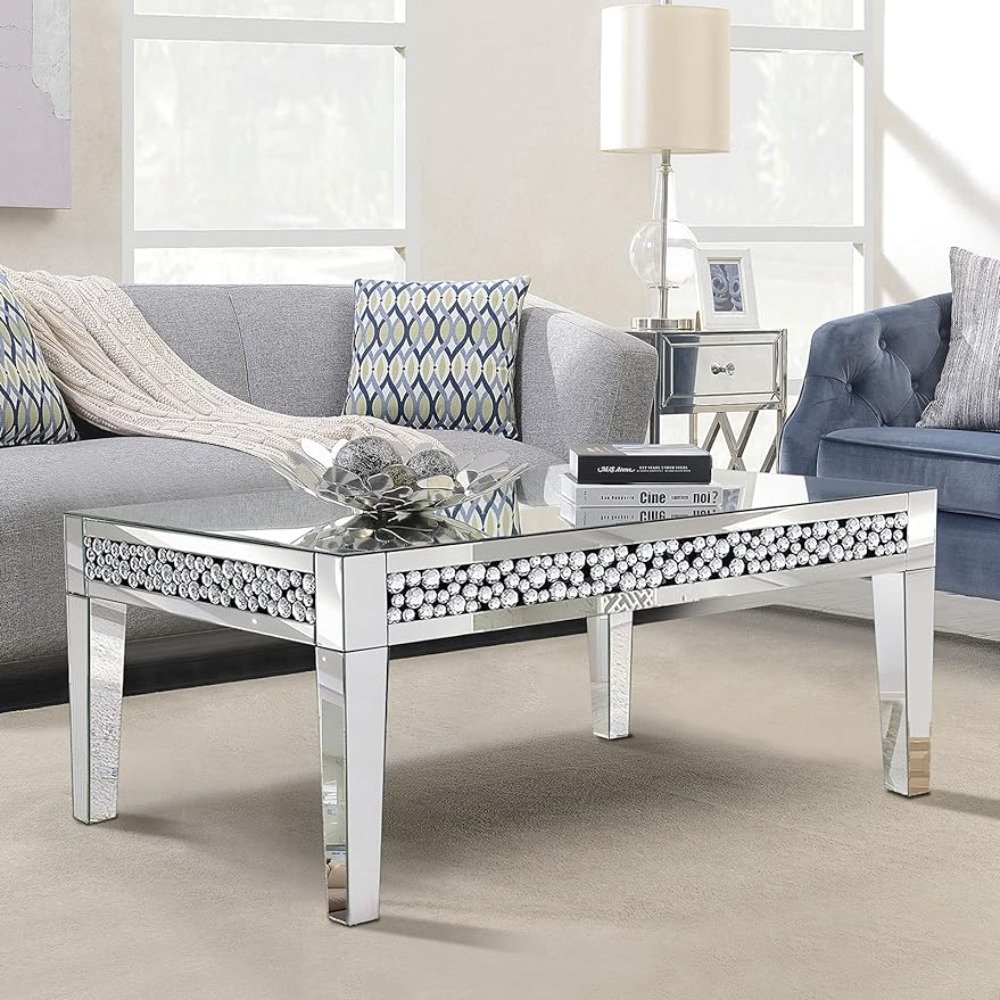 Elevate your space with the Luxury Rectangular Mirror Coffee Table, a stunning blend of modern sophistication and minimalist design. Crafted with high-quality silver mirror glass and adorned with crystal diamond inlays, this table reflects light, brightening any room while adding a touch of glamour. Its durable MDF frame ensures longevity, and the easy assembly process makes it a hassle-free addition to your home or office. Perfect for modern interiors, this table combines functionality with luxurious style, making it an ideal centerpiece for any living room, office, or boutique.