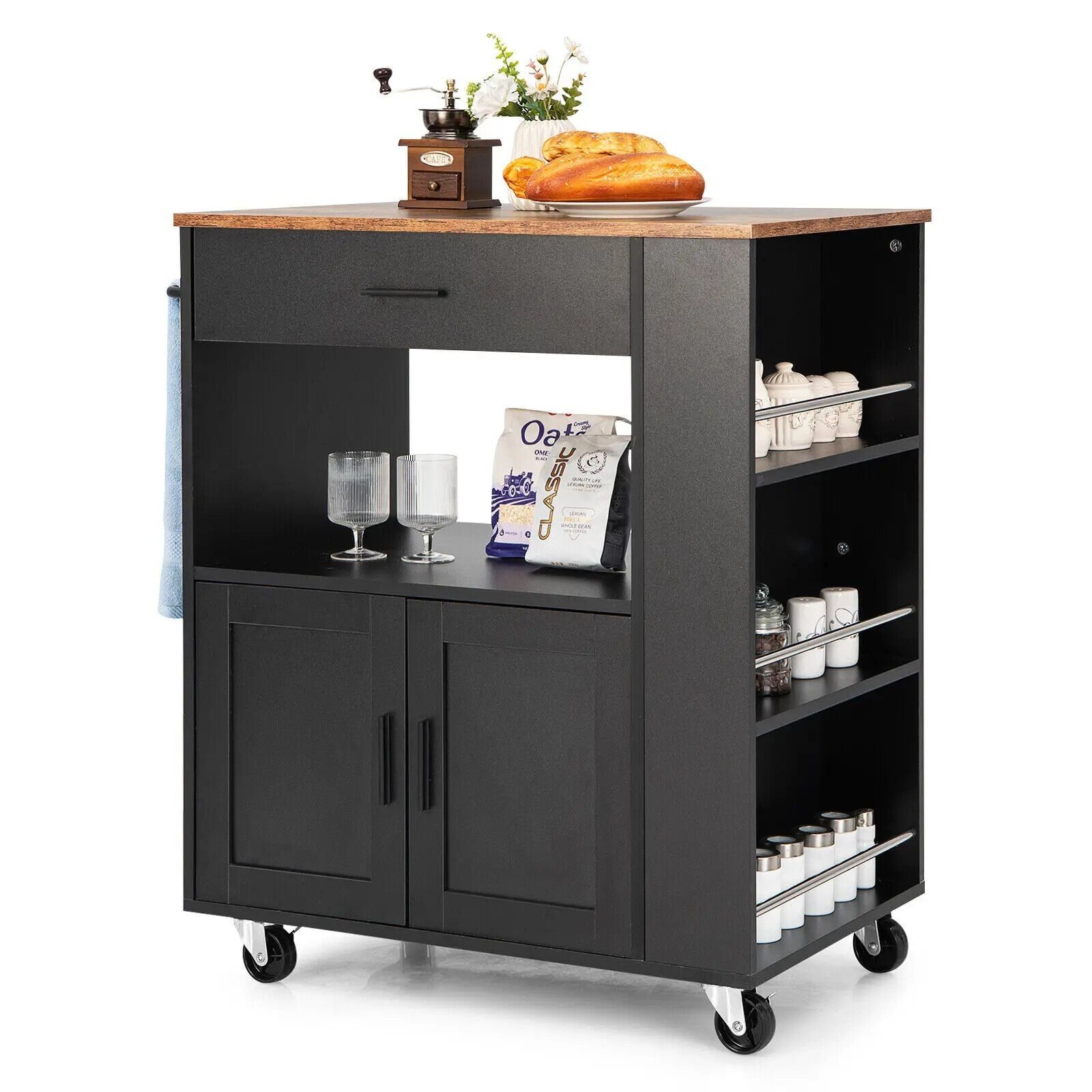 cb4a185a38bc0fa245f7681f5d5fc1a0.jpg-full Introducing the Modern Rolling Kitchen Island Cart – the perfect combination of style, convenience, and functionality for your kitchen. Crafted from sturdy engineered wood and iron, this sleek black cart features multiple storage options, including a convenient drawer and 3 built-in spice racks. Its smooth-rolling wheels make it easy to move and reposition, while lockable wheels ensure stability when stationary. Whether you're preparing meals, storing essentials, or serving guests, this versatile cart provides the perfect blend of workspace and storage. Upgrade your kitchen today with this stylish and practical addition!