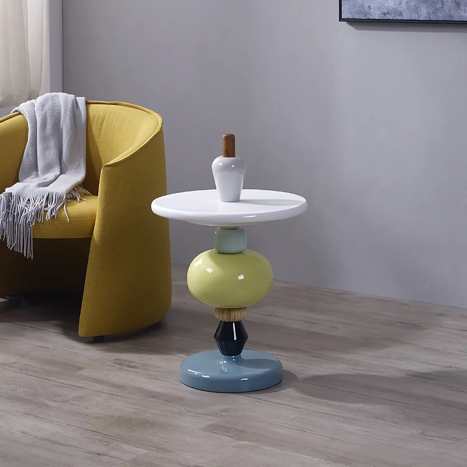 Enhance your home with the sleek and versatile Nordic Modern Minimalist Side Table. Crafted from durable stainless steel, this modern round table adds a touch of elegance to any room. Its compact, movable design makes it perfect for small spaces, offering a convenient surface for drinks, books, or decor items. Available in multiple stylish color options, it seamlessly blends into living rooms, bedrooms, and offices, providing both practicality and contemporary charm. Ideal for flexible placement, this side table is a must-have for any modern home.