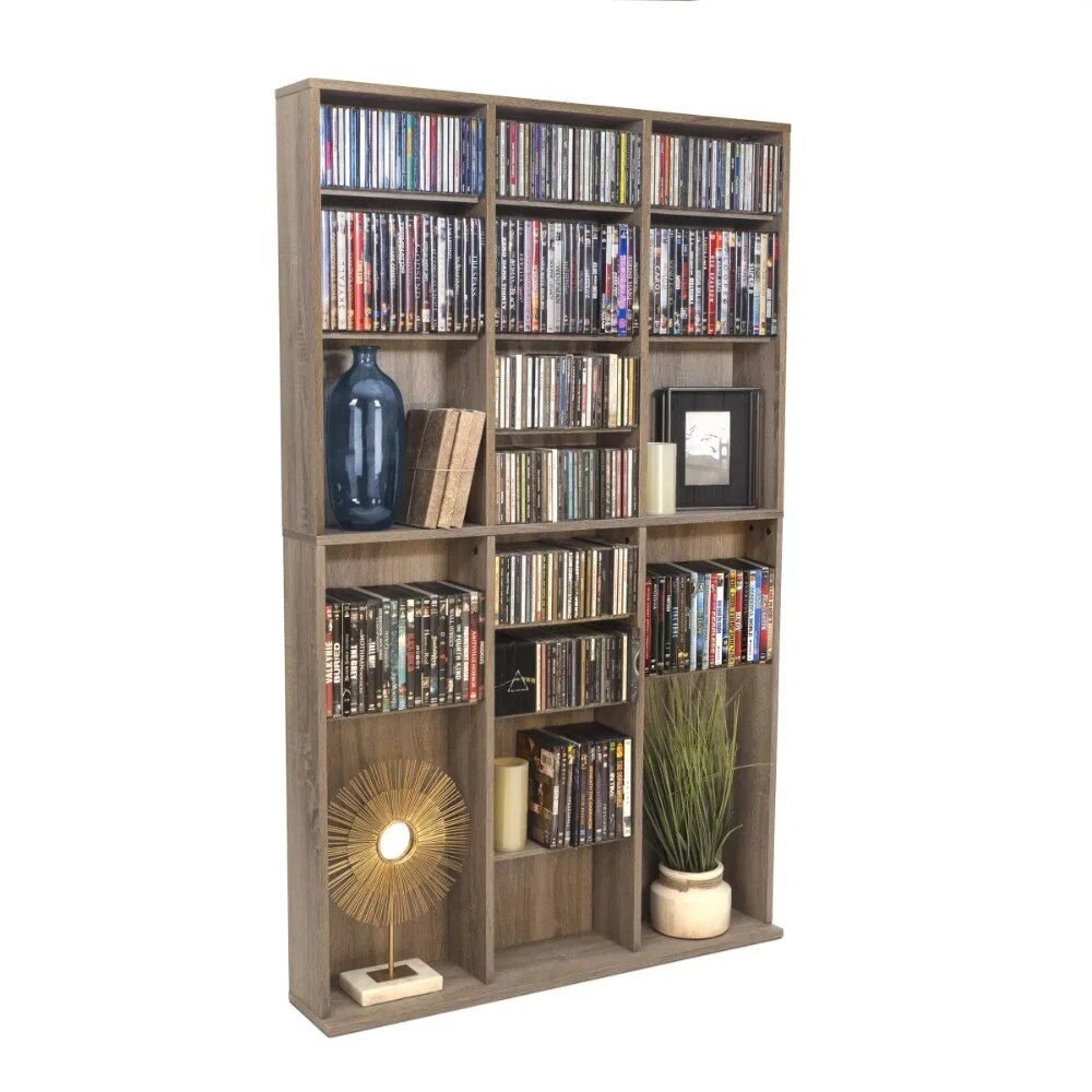 Elevate your space with the Weathered Oak Woodgrain Media Storage Bookcase, where style meets functionality. Featuring adjustable shelving and a sturdy wide base, this bookcase offers generous storage for books, media, and collectibles while maintaining a sleek, contemporary design. The warm maple tones and weathered oak finish bring a timeless charm to any room, from living rooms to home offices. Whether you're organizing your media collection or showcasing your favorite items, this versatile piece adapts to your needs with ease. Experience the perfect balance of elegance and practicality—order yours today!