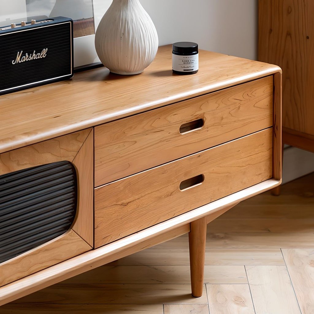 modern-nordic-wooden-tv-stand-07-min.jpg-full Transform your living room with our Modern Nordic Wooden TV Stand, the perfect blend of style and functionality. Featuring a sleek contemporary design, premium wooden construction, and high-quality paint finish, this TV stand is built to last. It offers ample storage with spacious drawers and shelves, making it ideal for organizing your media devices. Its versatile design complements various home décors, particularly modern and Scandinavian-inspired interiors. Elevate your space with this durable, stylish piece—perfect for any occasion.