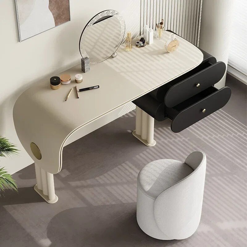 Introducing our Modern Minimalist Oak Vanity Set, a perfect blend of elegance and functionality for your bedroom. Crafted from solid oak with a luxurious saddle leather top, this vanity set features a sleek, French minimalist design that adds sophistication to any space. It includes a built-in mirror, comfortable makeup stool, and two drawers for ample storage, providing a functional yet stylish solution for your beauty routine. Easy to assemble, this set is ideal for anyone looking to elevate their bedroom with both practicality and luxury.