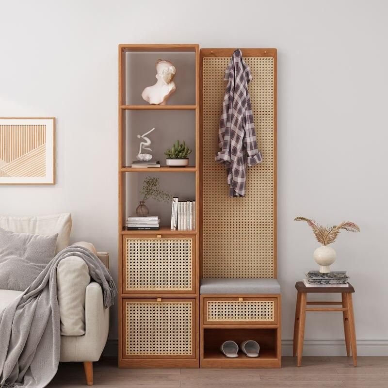 3b9ffeea8994b942b53c8ef15c4c0ff2.jpeg-full Elevate Your Space with the Modern Minimalist Wood Rattan Shoe Cabinet. This stylish piece combines sleek, contemporary design with practical functionality. Crafted from solid wood and rattan, it serves as both a shoe rack and a chic room divider, adding a touch of modern Moroccan elegance to your home. With easy assembly, durable construction, and ample storage, it keeps your shoes neatly organized while maximizing space. Ideal for living rooms, hallways, or bedrooms, this cabinet is the perfect blend of beauty and utility. Transform your home today with this versatile and stylish storage solution!