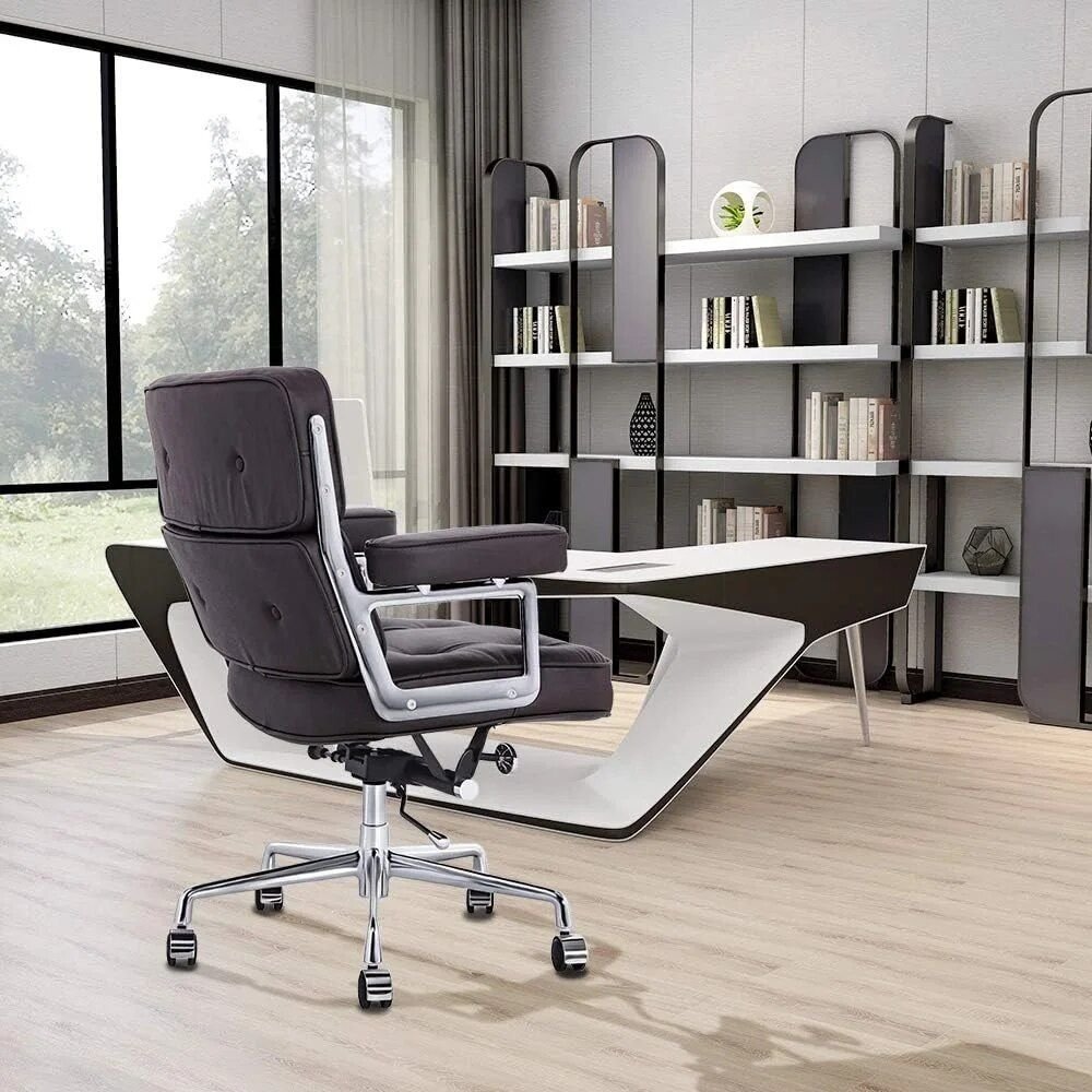 414901f02848689c59849674c24dd555.jpg-full Elevate your workspace with the Luxurious Genuine Leather Swivel Office Chair—the perfect blend of style, comfort, and functionality. Crafted from premium genuine leather, this chair offers an executive look with exceptional ergonomic support, making it ideal for long hours at the desk. Features include a 360-degree swivel, supportive handrails, a high backrest for optimal posture, and smooth rollers for easy mobility. Available in black, brown, and beige white, this chair is designed to complement any office décor while providing lasting comfort and durability. Perfect for professionals who demand both luxury and performance.