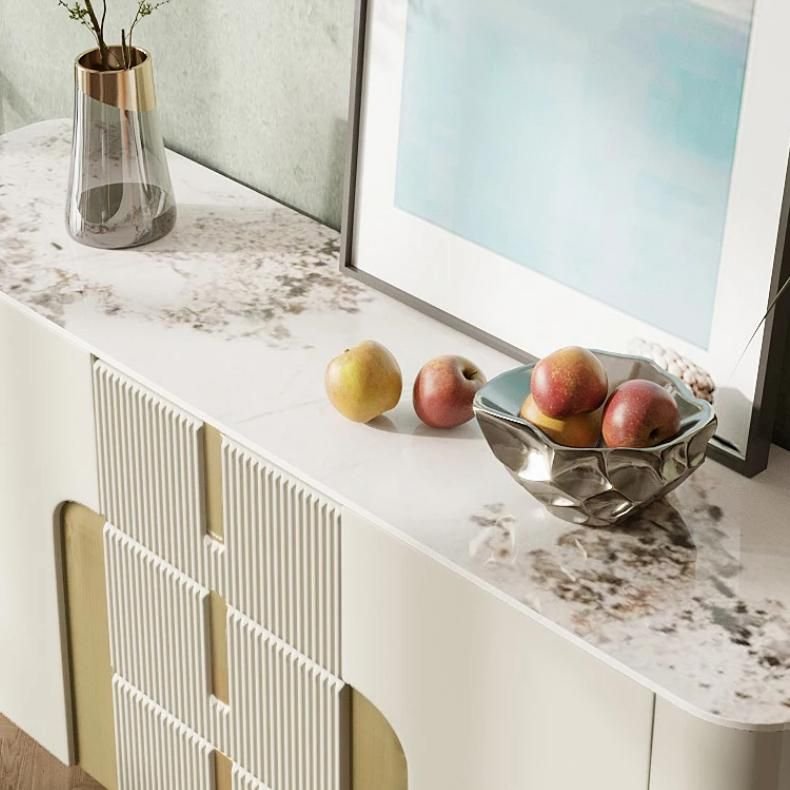42bb8e487d71fe2f61aac3034656c519.jpeg-full Enhance your home with the Elegant Slate Top Sideboard, a perfect blend of modern design and practical functionality. Featuring sleek, minimalist lines and a durable slate top, this sideboard offers generous storage while adding a sophisticated touch to any room. Crafted with eco-friendly, non-polluting materials and rounded corners for safety, it’s ideal for living rooms, kitchens, or entrance halls. The versatile design complements any decor, making it a stylish, functional addition to your home.
