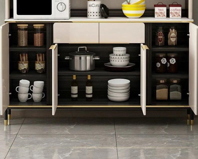 4e8c67cd5a9e0786ac8713528f117ce4.jpeg-full Introducing the Elegant White Nordic Sideboard Cabinet, a perfect blend of minimalist design and functional elegance. Crafted from premium wood with a clean, white finish, this versatile piece enhances any space—from dining rooms to kitchens or living areas. Its sleek, modern design offers ample storage with spacious drawers and cabinets, making it both stylish and practical. Ideal for organizing essentials or displaying decor, this sideboard brings a touch of sophistication to any room, fitting seamlessly into various decor styles, from contemporary to farmhouse.