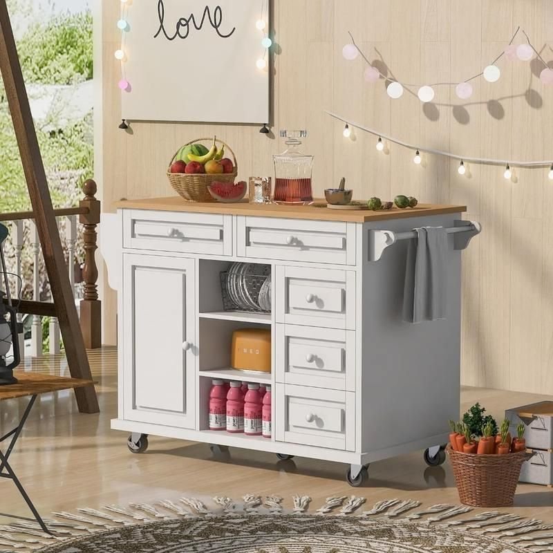 4fd09a18bdc2b75d582c618a876c7bd2.jpeg-full Enhance your kitchen with our Versatile Rolling Kitchen Island, a perfect blend of style and practicality. Featuring a sturdy rubberwood countertop ideal for meal prep and serving, this cart offers ample storage with five spacious drawers and shelves. Its easy mobility, with five wheels (two lockable for stability), allows for flexible use in any kitchen. The sleek white finish complements any décor, while the easy-to-maintain surface keeps your kitchen organized and efficient. No assembly required—just roll it into your space and enjoy the added functionality and elegance.