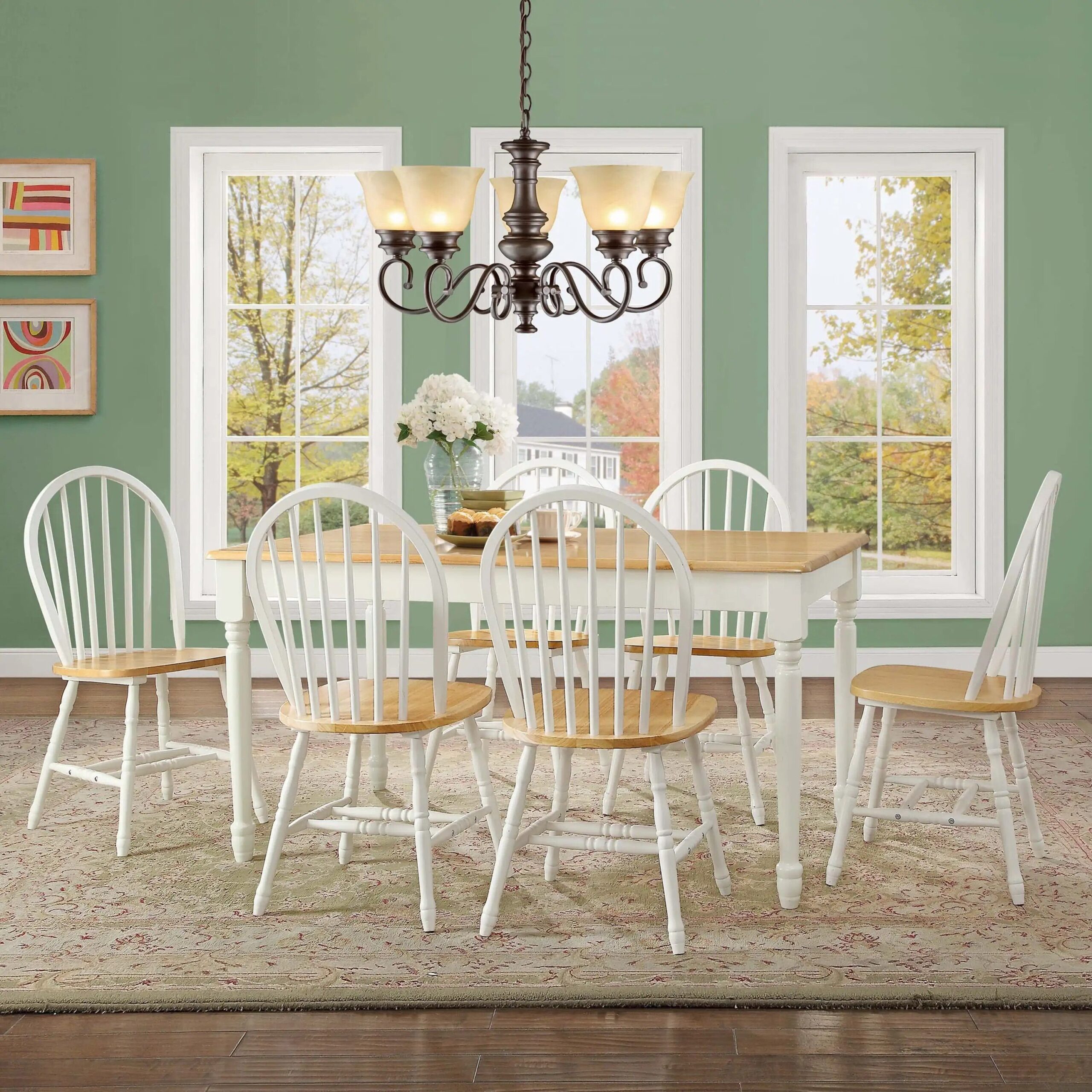 618b86d43dbc5080346e4cd3bf9df498.jpg-full Elevate your dining space with the Autumn Lane Windsor Dining Chairs. Crafted from solid wood with a charming White and Oak finish, these chairs combine classic farmhouse elegance with modern durability. Featuring stylish turned-wood legs and back, they offer both beauty and sturdy support. Ideal for any room—dining room, kitchen, or breakfast nook—these chairs complement a variety of interior styles and coordinate perfectly with the Autumn Lane Dining Table. Easy to assemble and built to last, they’re the perfect addition to create a warm, inviting dining atmosphere.