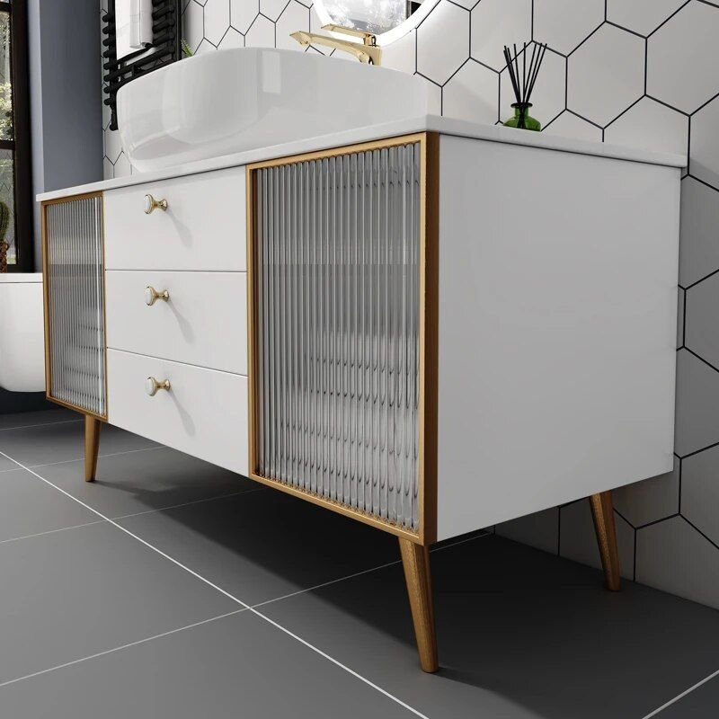 Transform your bathroom with the Modern White Oak Bathroom Vanity Set, a stunning combination of elegance and practicality. Crafted from premium oak with a sleek white finish, this set features a luxurious marble countertop and an illuminated mirror for a modern touch. Designed to simplify your bathroom upgrade, this vanity set provides everything you need in one complete package. Its timeless design complements any contemporary decor, making it the perfect choice for both busy mornings and relaxing evenings. Elevate your space with this blend of style, durability, and functionality—order yours today!