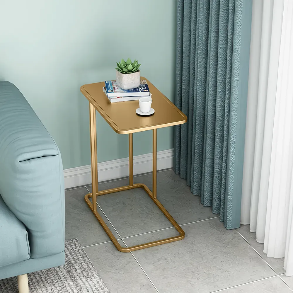 Introducing the Luxe Marble-Top Iron Side Table, a perfect fusion of modern minimalism and luxury. With a premium iron frame and a stunning marble top, this table adds a sophisticated, contemporary flair to any space. Its geometric design, radiant gold finish, and sleek rectangular shape make it a statement piece that enhances your decor without overwhelming it. Ideal for displaying decor, holding drinks, or as an accent in your living room or office, this table combines function with timeless elegance. Elevate your space today with this luxurious addition to your home.