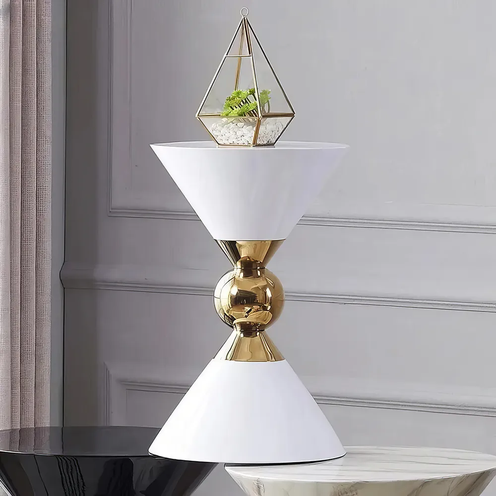 680079416d93f90dc3d5d22aeea2c0ac-cleanup-2 Introducing our Minimalist Modern Nordic Round Side Table, where elegance meets practicality. With its unique alien-shaped design and sleek, storage-free construction, this table adds a touch of contemporary sophistication to any space. Its sturdy, non-retractable structure ensures stability, while the minimalist aesthetic complements modern interiors. Easy to assemble and versatile, this table is perfect for small spaces and ideal for displaying decorative items or holding everyday essentials. Bring home this statement piece for a stylish, clutter-free living room.