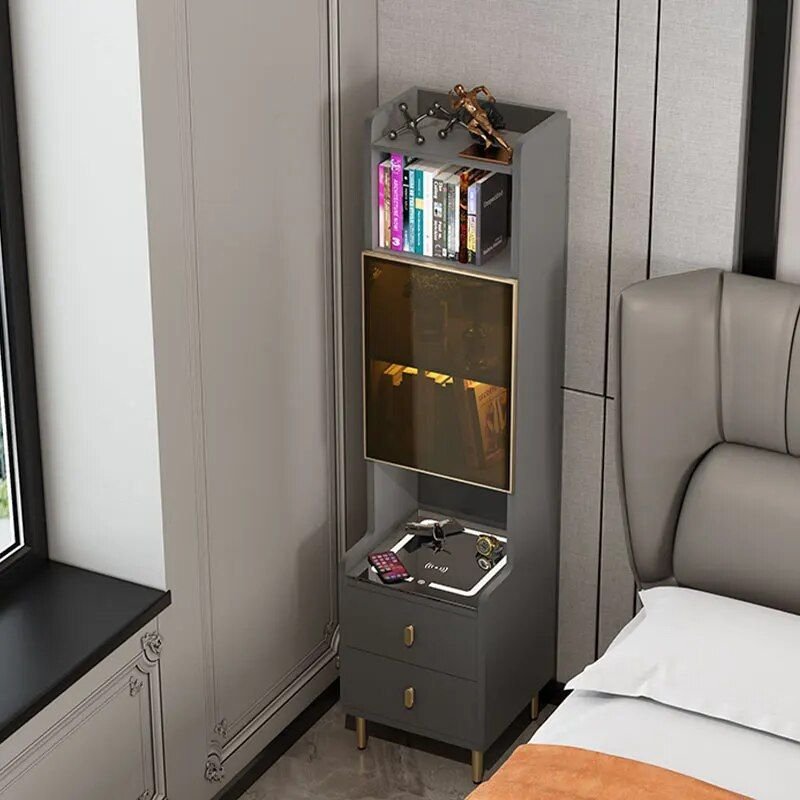 Elevate your bedroom with the Modern Smart Wireless Charging Bedside Table, where style meets functionality. Featuring a sleek Moroccan-inspired design, this nightstand offers wireless charging for your devices, eliminating clutter and cables. Crafted from sturdy man-made board, it provides ample storage with a single door and additional space for essentials. Pre-assembled for easy setup, it’s the perfect addition for those who want convenience and elegance in their modern bedroom. Upgrade your space today with this stylish and practical bedside table!
