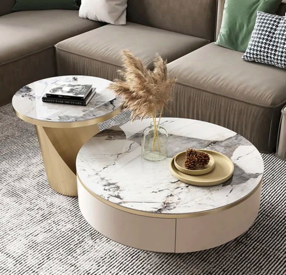 833410fe0f63c6977c8fdad85e8a230f.jpg-full Elevate your living space with our Modern Round Wooden Coffee Table, a perfect blend of style and functionality. Featuring a spacious surface and unique round design, this table adds a touch of contemporary elegance to any room. Crafted from high-quality wood, it offers durability and versatility, ideal for both casual gatherings and decorative displays. With its sturdy construction and timeless appeal, this coffee table is a must-have addition to modern homes.