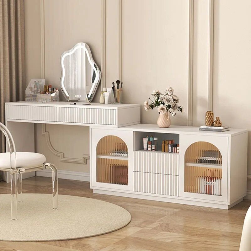 Elevate your bedroom with the Modern Luxury Glass Dressing Table, a stunning fusion of elegance and functionality. Featuring a high-quality wooden construction and a spacious, elegantly framed mirror, this dressing table offers a chic, contemporary design. It includes smart storage features to keep your cosmetics and accessories organized while adding a touch of sophistication to your space. Ideal for daily beauty routines, this luxurious piece combines practicality with modern style, making it the perfect addition to any bedroom. Transform your space today with this stylish and functional dressing table!