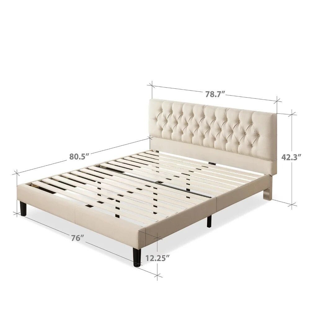 910f65bcaa393bb542aeed8e9524efbe.jpg-full Transform your bedroom into a luxurious retreat with the King-Sized Upholstered Platform Bed Frame. Featuring a timeless button-tufted design and a robust steel framework, this bed offers both elegance and durability. The wooden slat system eliminates the need for a box spring, providing excellent mattress support. With a 700 lb weight capacity and easy two-person assembly, this bed is designed for both comfort and longevity. Available in neutral shades, it seamlessly fits into any decor. Mattress and box spring not included.