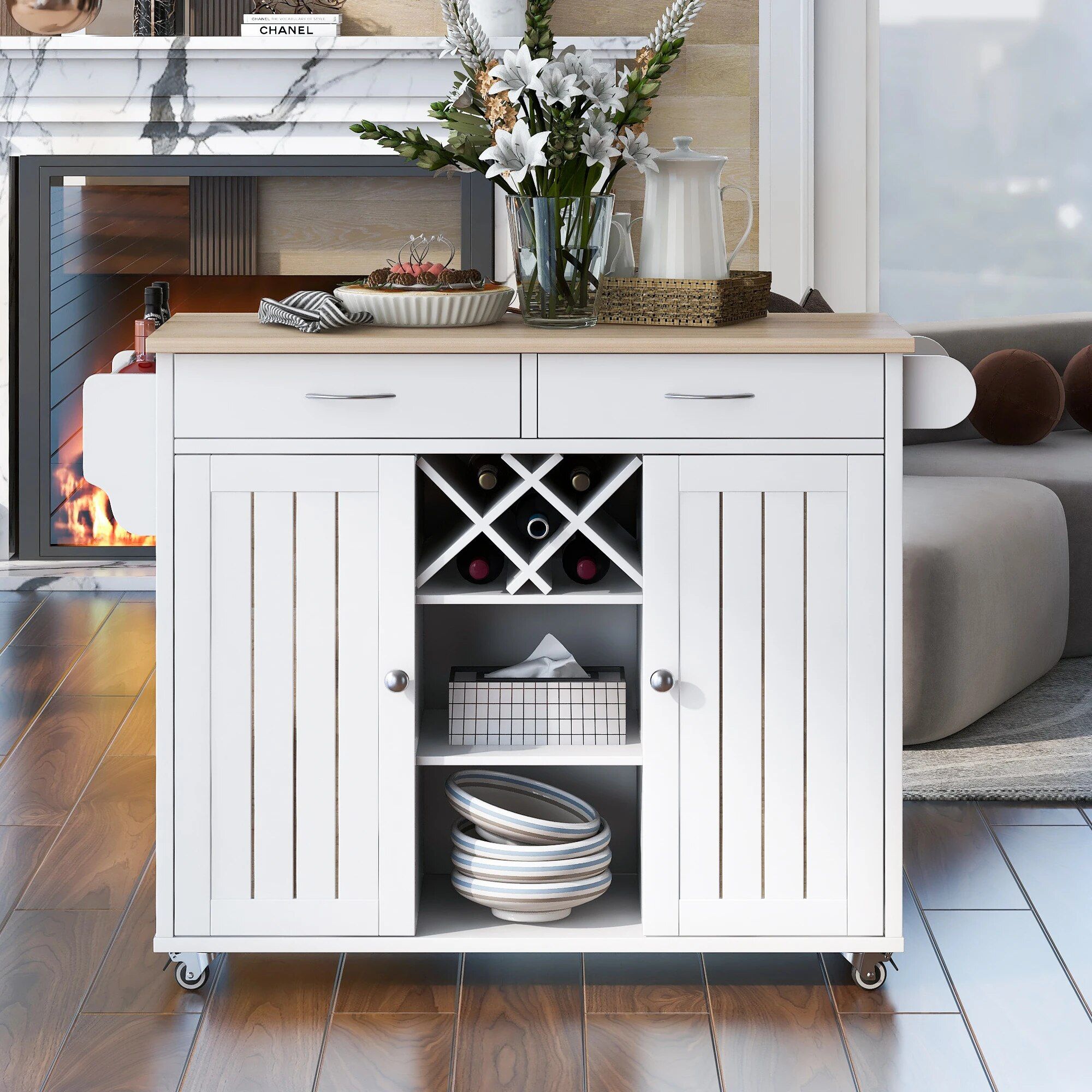 Elevate Your Culinary Space with our Multi-Purpose Kitchen Island Cart. This stylish and functional piece is perfect for any kitchen, dining room, or hallway. Featuring ample storage with two easy-glide drawers, large cabinets, open shelves, and a built-in wine rack for five bottles, it provides both organization and display space. The four smooth-rolling wheels make it easy to move, with lockable wheels for stability. Constructed from durable mahogany wood with a sleek, heat-resistant veneered top, this kitchen island cart combines elegance and practicality. Simple assembly and premium materials ensure long-lasting use. Order now and enhance your kitchen with this versatile, high-quality cart!
