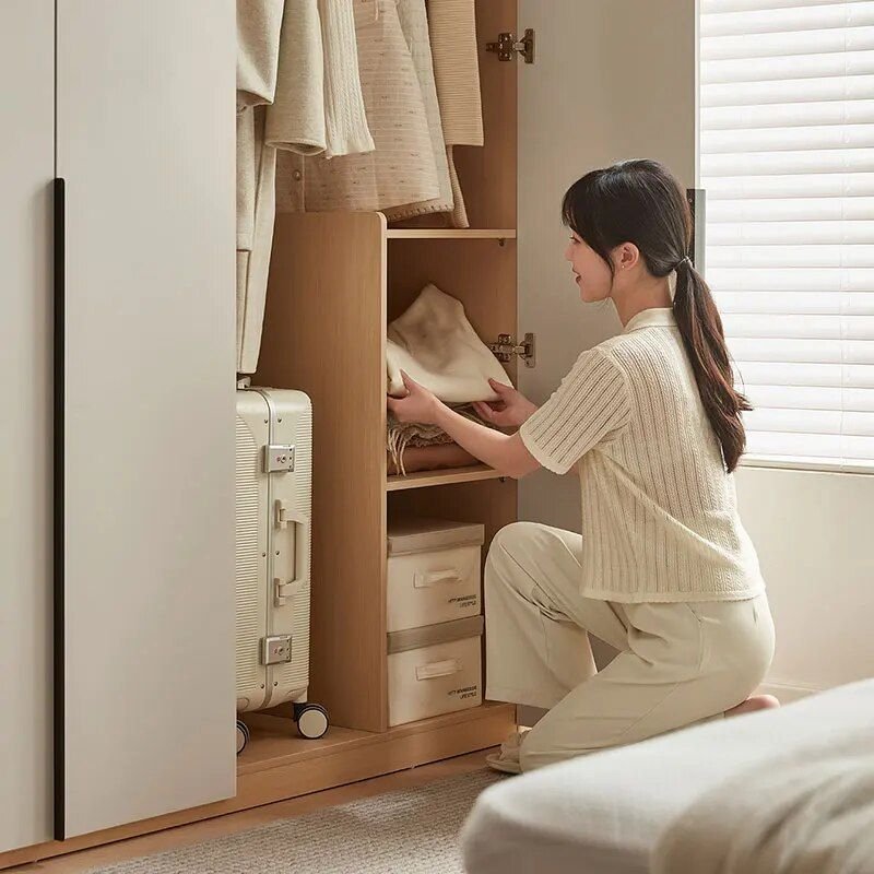 Introducing the Compact Elegance Modern Wardrobe—the perfect solution for small living spaces. Designed with efficiency and style in mind, this wardrobe offers a sleek, space-saving design without compromising on storage or aesthetic appeal. With its modern silhouette and durable construction, it enhances any bedroom or living area while providing easy access to your essentials. Ideal for apartments, studios, or guest rooms, this wardrobe maximizes your space and keeps your environment organized and clutter-free.