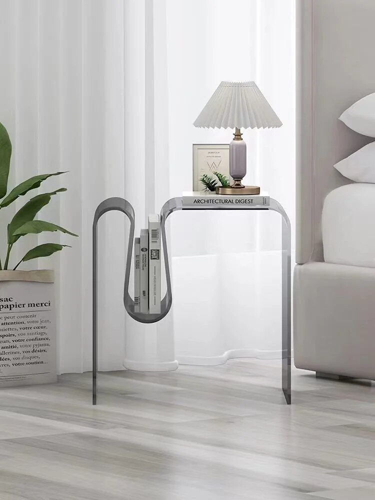 bf007975787b0387731422ccbe9be6a4.jpg-full The Modern Acrylic Water Drop Coffee Table is a stunning blend of minimalist design and functional art. With its unique water drop shape, this table adds a touch of modern luxury to any room. Crafted from high-quality acrylic, it’s durable, easy to clean, and requires no assembly. Measuring 45x30x45cm, it's perfect for small to medium spaces, offering both style and practicality with its efficient storage functionality. Ideal for living rooms, offices, or bedrooms, this table serves as a conversation-starting centerpiece, elevating your space with its light luxury and artistic charm.