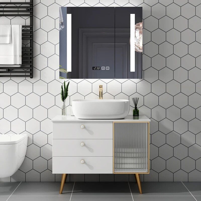 Transform your bathroom with the Modern White Oak Bathroom Vanity Set, a stunning combination of elegance and practicality. Crafted from premium oak with a sleek white finish, this set features a luxurious marble countertop and an illuminated mirror for a modern touch. Designed to simplify your bathroom upgrade, this vanity set provides everything you need in one complete package. Its timeless design complements any contemporary decor, making it the perfect choice for both busy mornings and relaxing evenings. Elevate your space with this blend of style, durability, and functionality—order yours today!