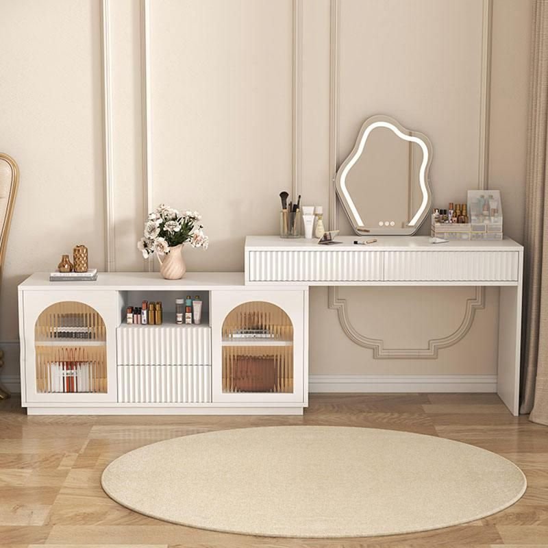 Elevate your bedroom with the Modern Luxury Glass Dressing Table, a stunning fusion of elegance and functionality. Featuring a high-quality wooden construction and a spacious, elegantly framed mirror, this dressing table offers a chic, contemporary design. It includes smart storage features to keep your cosmetics and accessories organized while adding a touch of sophistication to your space. Ideal for daily beauty routines, this luxurious piece combines practicality with modern style, making it the perfect addition to any bedroom. Transform your space today with this stylish and functional dressing table!