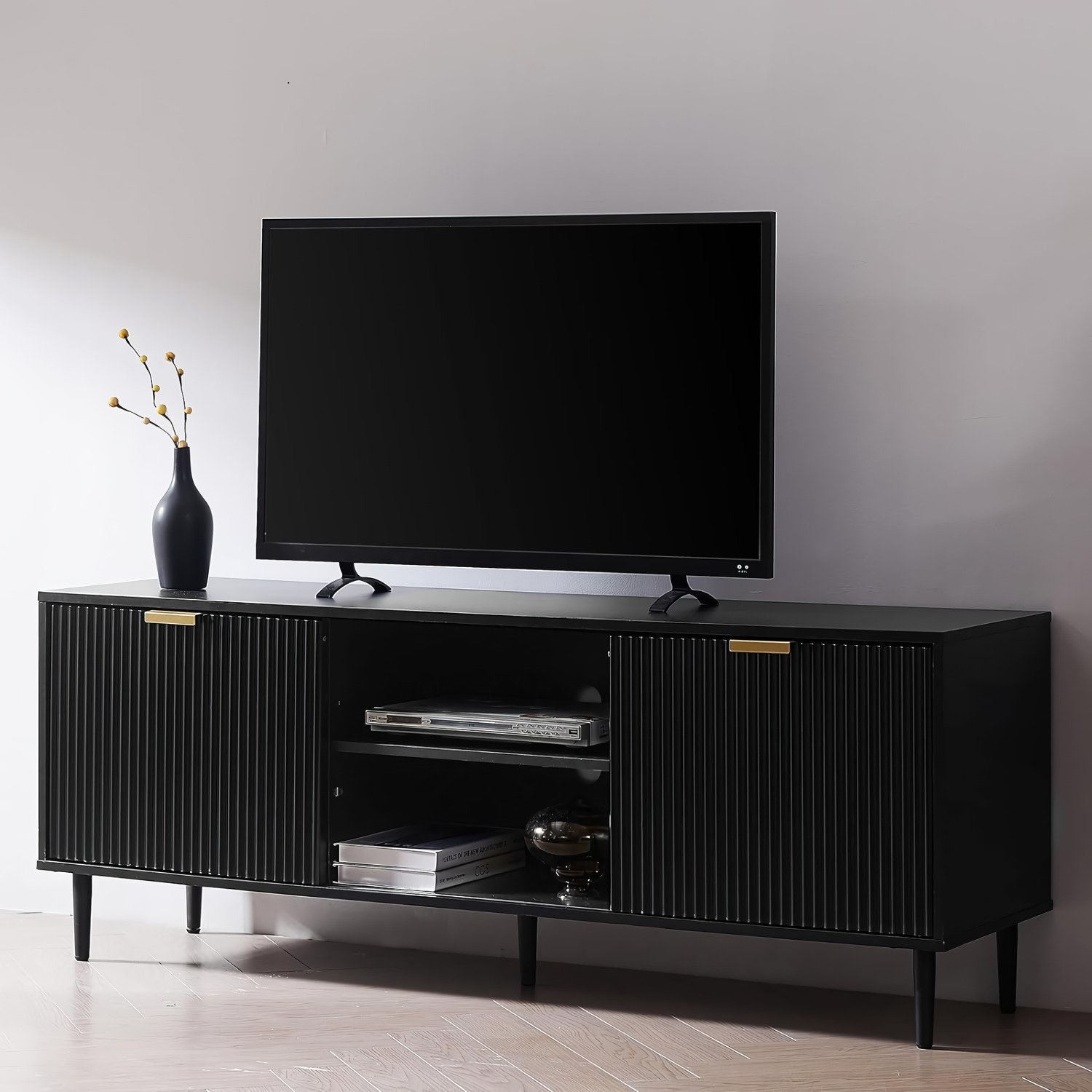 ce024951a74e8eae07fd8c3e2c839c67df62db16-s1-n2-y2.jpg-full Revolutionize Your Living Space with the Waveform Wood TV Stand. Designed for TVs over 65 inches, this modern and minimalist TV stand combines style and practicality. Featuring sliding doors with fluted panel design and adjustable shelves, it offers versatile storage for your media devices while enhancing your room's aesthetic. The engineered wood construction ensures stability, and the easy assembly process makes setup a breeze. Perfect for any living room, bedroom, or home office, this TV stand brings both elegance and functionality to your space.